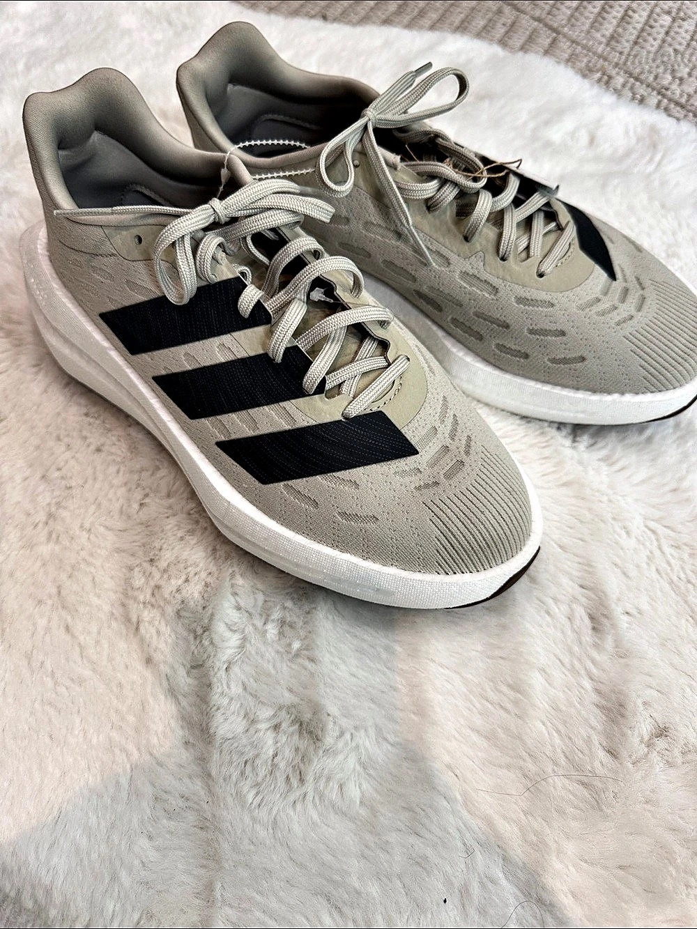 NWT These sage-green Adidas Flowboost sneakers. Men’s 7.5